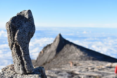 Close-up of rock against clear sky