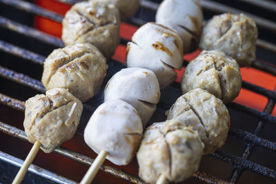 High angle view of meat on barbecue grill