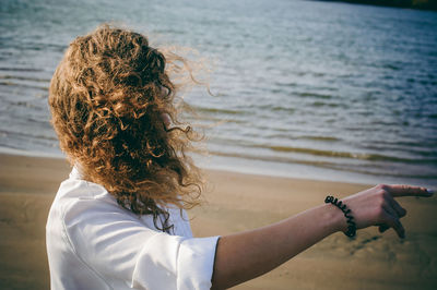 Woman standing at beach