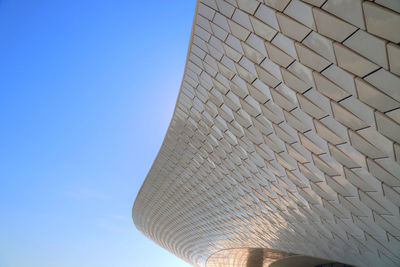 Low angle view of building against blue sky