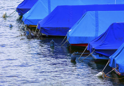 High angle view of boats moored in harbor