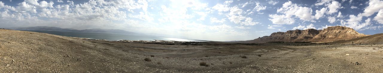 Panoramic view of desert against sky