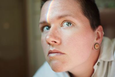 Portrait of young woman looking away