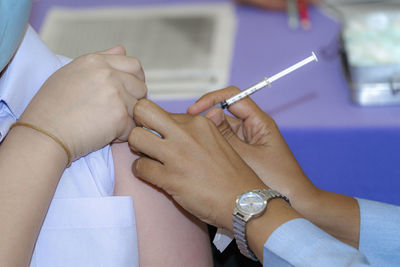 Close-up of woman holding hands