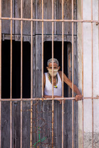 Portrait of man in old building