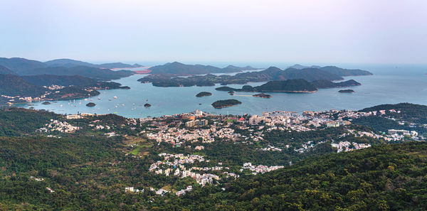 High angle view of bay and sea against sky