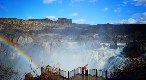 Panoramic view of rainbow over mountain