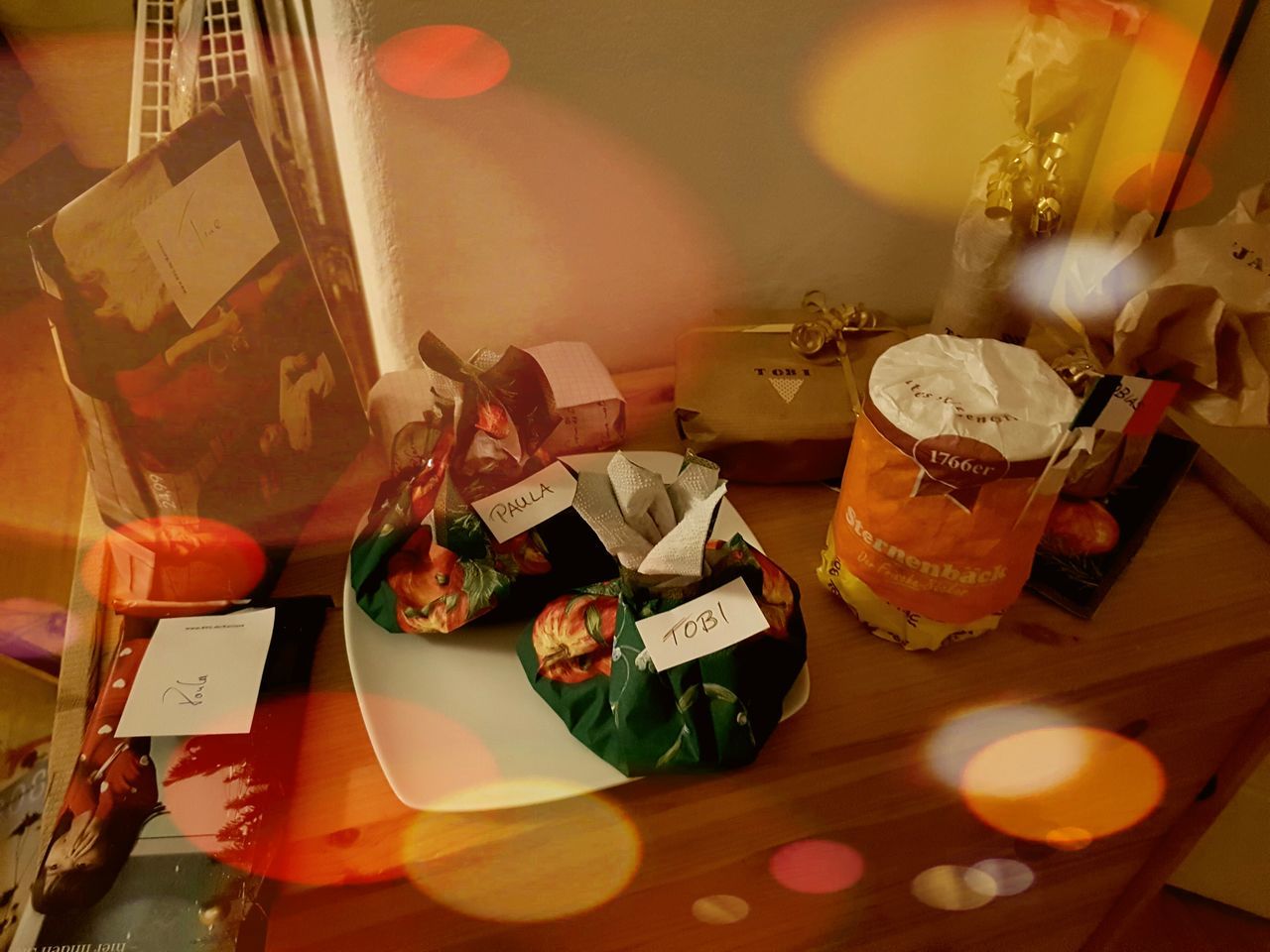 indoors, table, high angle view, no people, celebration, illuminated, close-up, gambling, gambling chip, night