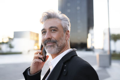 Businessman talking on smart phone