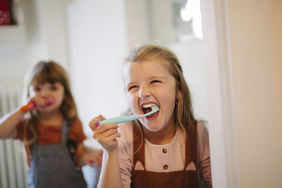 Girl brushing teeth