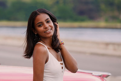 Portrait of smiling young woman