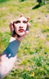 Portrait of young woman in sunlight