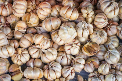 Full frame shot of onions for sale at market