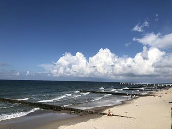 Scenic view of sea against blue sky