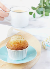 Still life with coffee and homemade muffin.