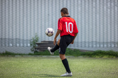 Boy on the football training, skills with the soccer ball local thailand