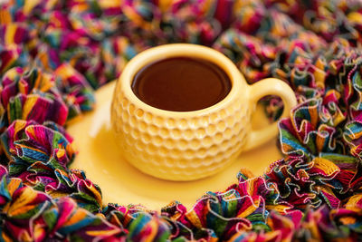 Close-up of coffee cup on table