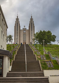 View of a long stairway leading up to a church in akureyri iceland in the summer