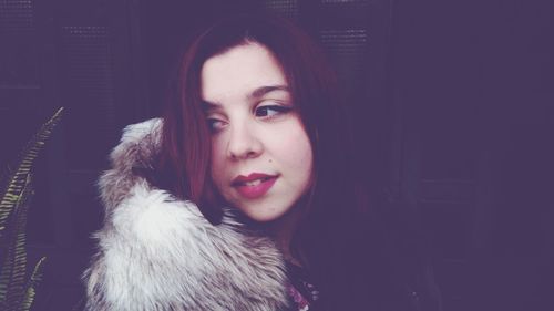 Close-up portrait of young woman