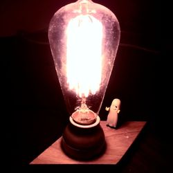 Close-up of illuminated light bulb