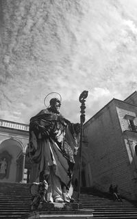 Low angle view of statue against sky