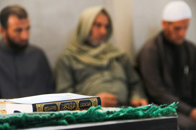 Group of people on book