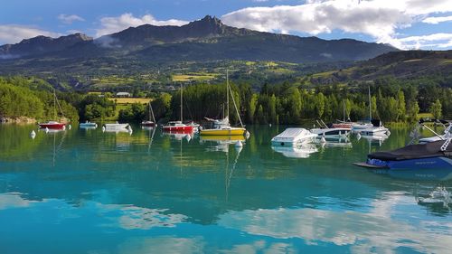 Scenic view of calm lake and mountains