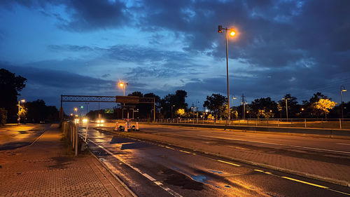 Illuminated street lights at night