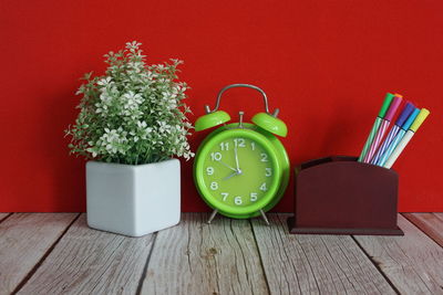 Close-up of clock on table