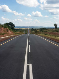 Empty road along landscape