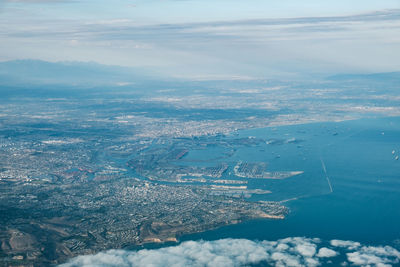 Aerial view of city against sky