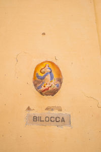 Close-up of picture on wall