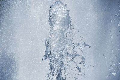 Close-up of ice crystals against blue background