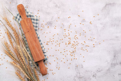 High angle view of bread on floor against white background