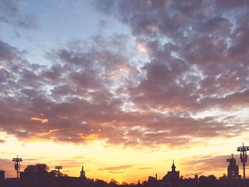 Low angle view of cloudy sky at sunset