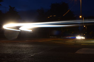 Light trails on road at night