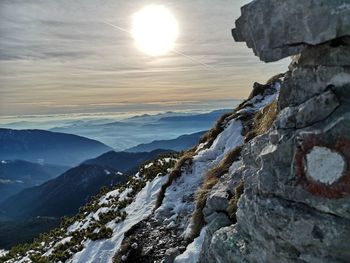 Scenic view of mountains against sky during sunset