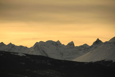 Scenic view of mountains against sky during sunset