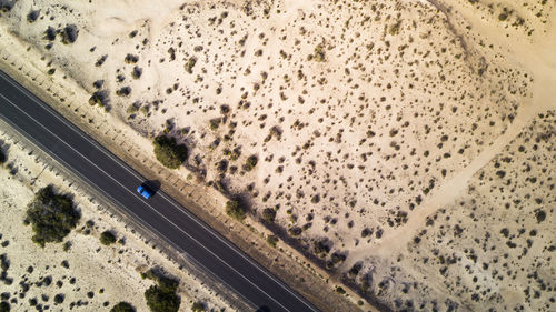 Aerial view of road on desert