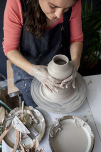 High angle view of woman working on table