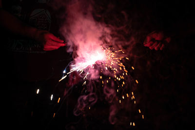 Firework display at night