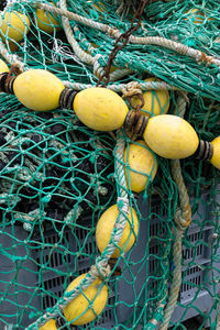 Close-up of fishing nets on crate