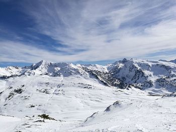 Scenic view of snow covered mountains