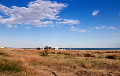 Scenic view of beach against sky