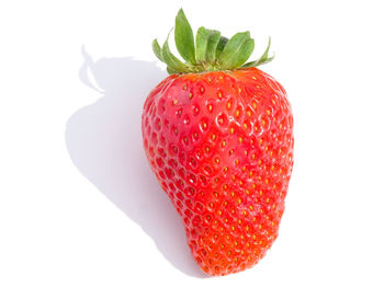 Close-up of strawberry against white background