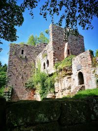 Low angle view of historic building against sky