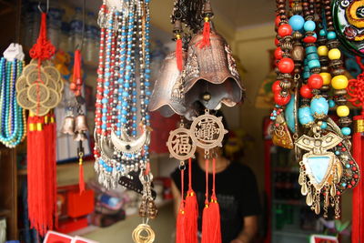 Ornaments  hanging in store for sale in market