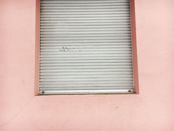 Closed shutter on wall
