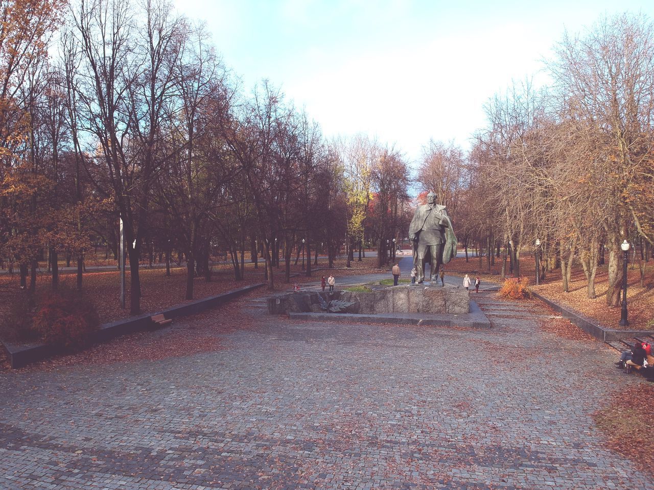 PEOPLE WALKING ON FOOTPATH IN PARK