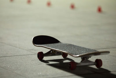 Skateboarding on the skate park with the light from the spotlight at night